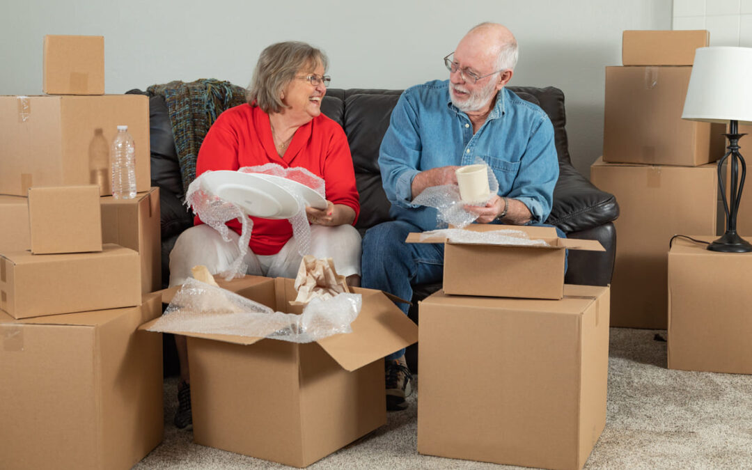 people going through boxes of items